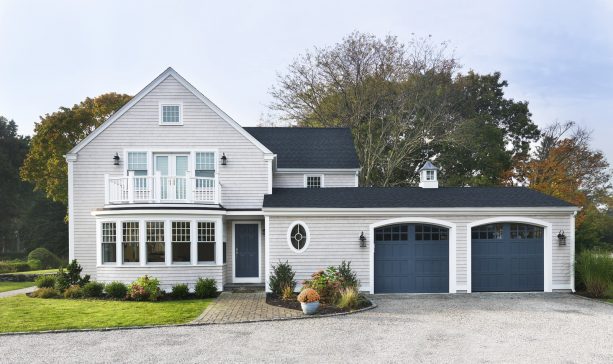 a dark newburyport blue benjamin moore side front door combined with white trim