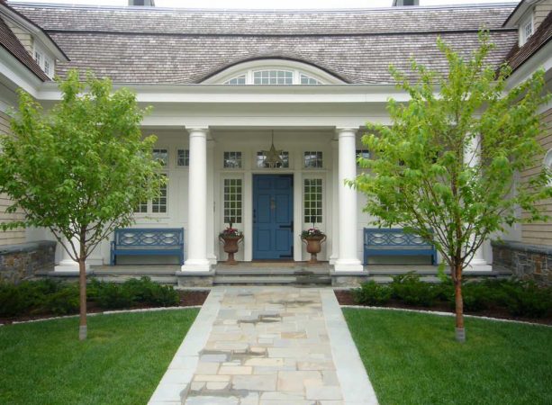 a victorian exterior house featuring a dark blue indigo batik sherwin williams front door