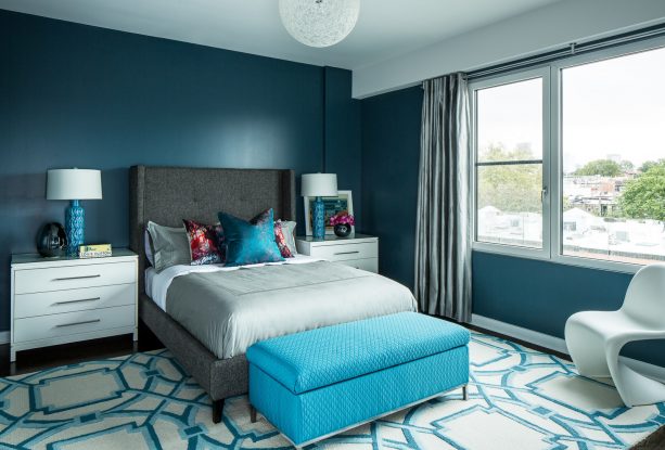 teal dominated contemporary bedroom with charcoal gray bed