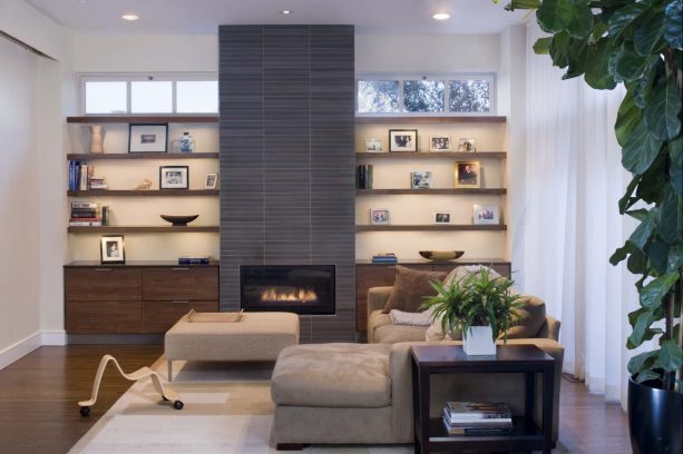 a custom-built walnut built-in shelves around a tile-wrapped fireplace