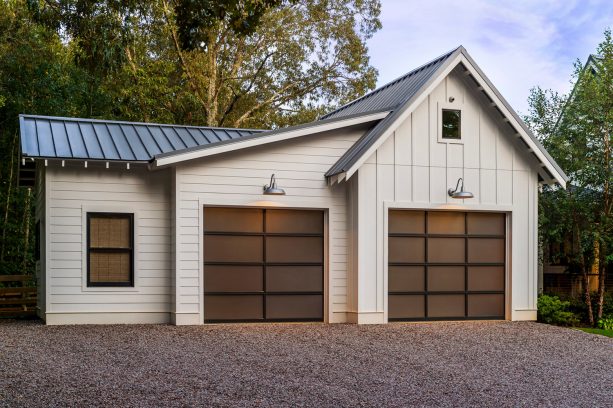 glass metal garage doors on a contemporary farmhouse style garage apartment