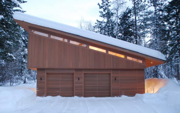 unique garage apartment with sustainable cedar siding and recycled metal roofing