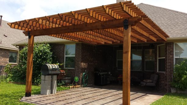 cedar pergola attached to a brown roof