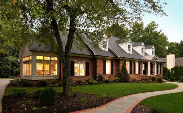 classic brick house exterior with shutters only for decoration