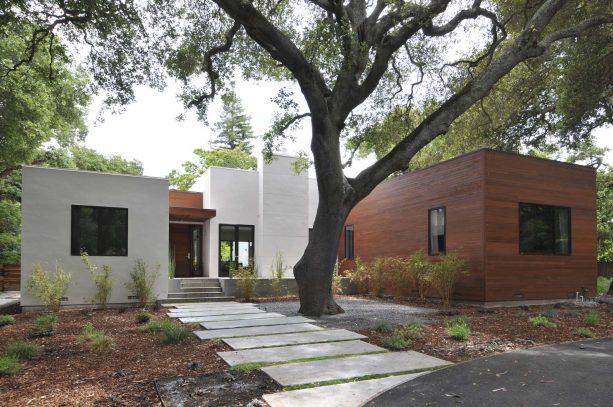 front walkway landscaping idea with contemporary-style concrete finish