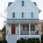 hardi-plank-arctic white home remodel with light blue window shutters