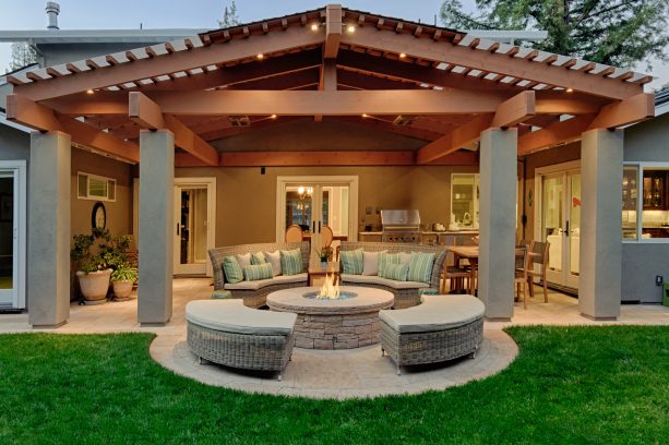 rustic pergola attached to a roof as a covered patio