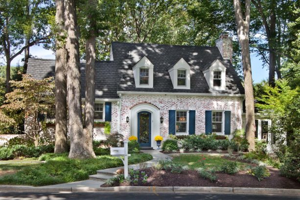 sand-blasted brick house with farrow & ball's hague blue #30 - finish shutters