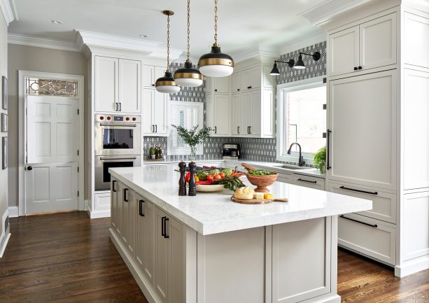 7" wall-mounted sconce light over a kitchen sink