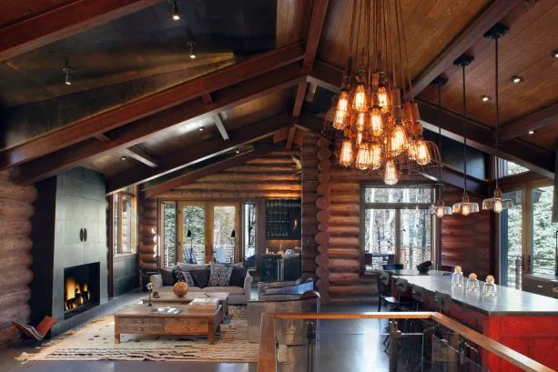 adjoined cabin living room and a bar in an open concept area
