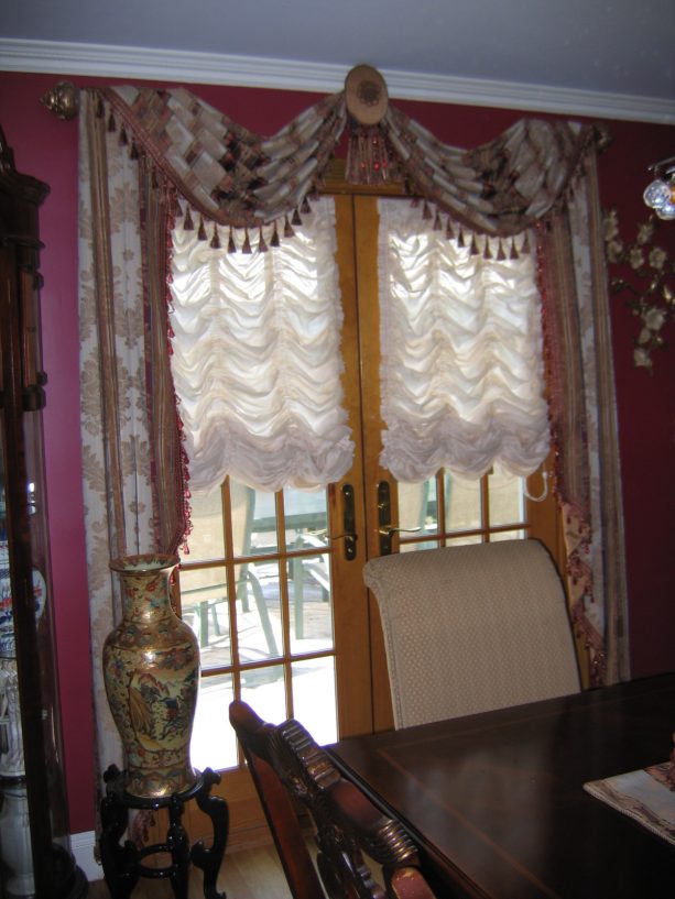 austrian shades with two swags and jabots to dress up the french doors in the dining room