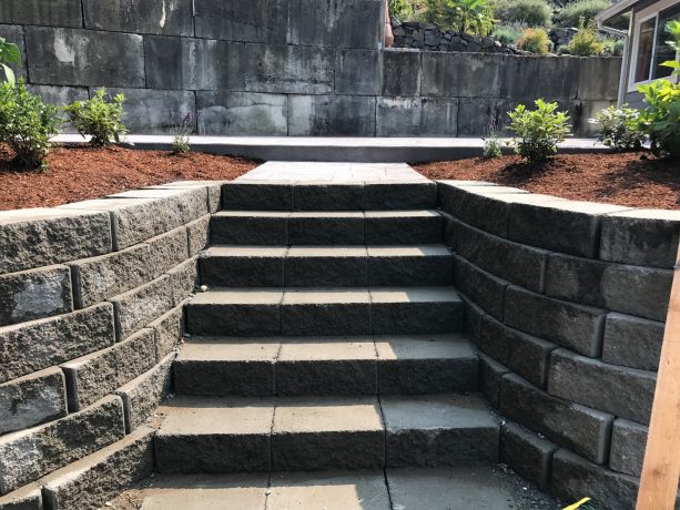 brick-shaped stamped concrete retaining walls with steps