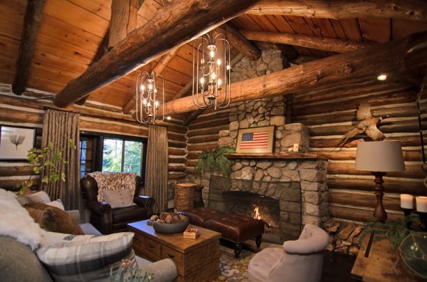 cabin living room ideas with exposed wooden beams and log structure