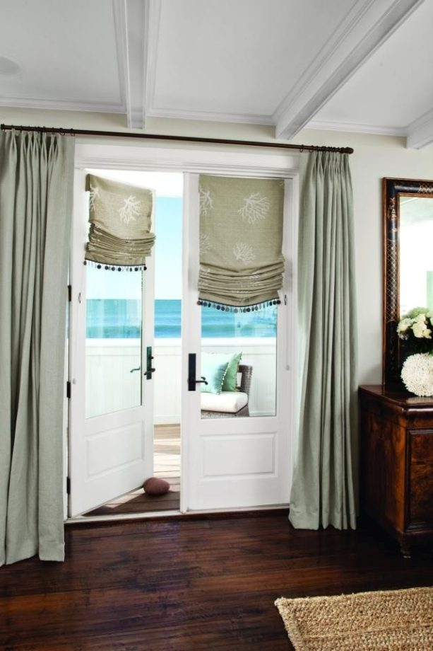 casual roman shades with linen draperies for french doors in a traditional room