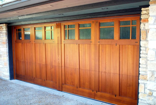 craftsman-style flat panel garage door made of african mahogany