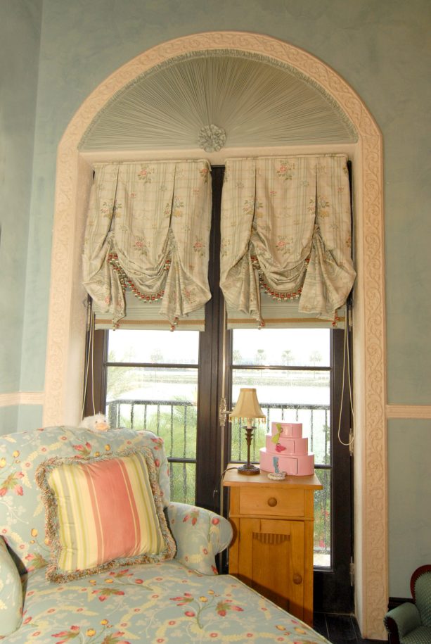 decorative balloon shades for the french door in a girl’s bedroom