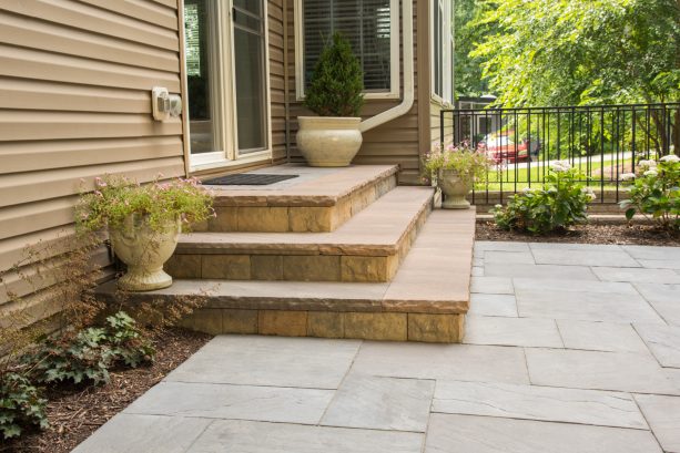 ep henry cast veneer stone with pennsylvania tread stock paver steps against a house