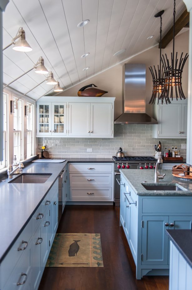 four lines of silver wall mounted light over undermount sink