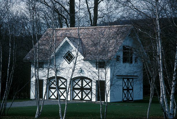 green and white color arched double x-brace barn garage doors