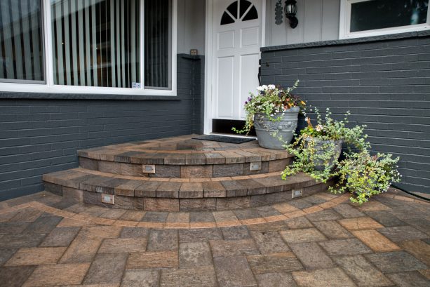 midcentury style paver steps against a traditional house