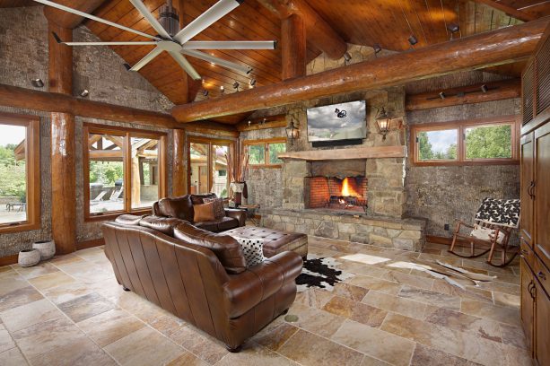 modern cabin living room with bark-textured walls