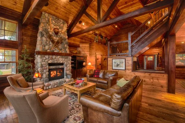 open concept cabin living room ideas with wood walls and floor