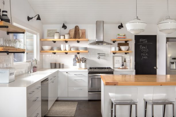 wall mounted light from rejuvenation over an integrated kitchen sink