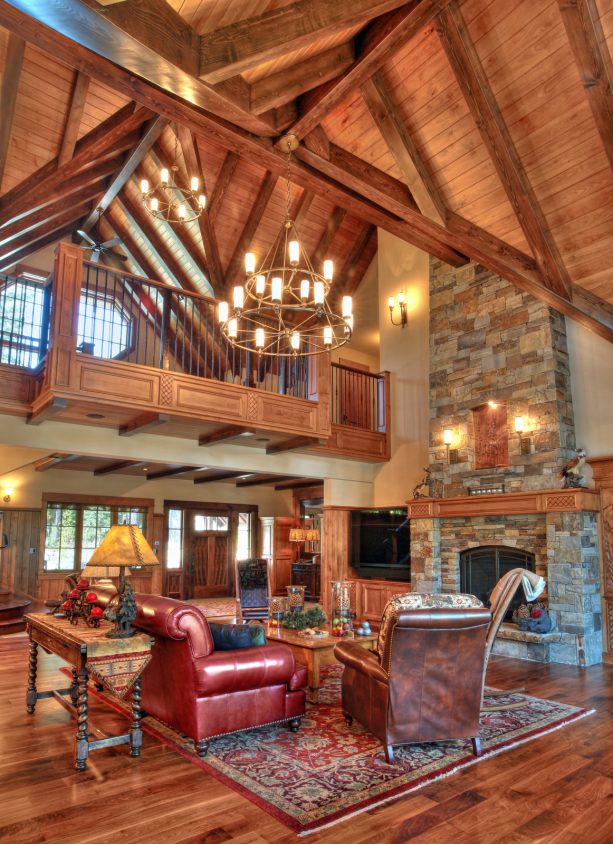 walnut floor and cedar ceiling in an open cabin living room