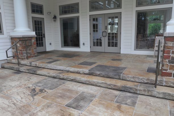 combination of light and dark grey stamped concrete to create a rustic look