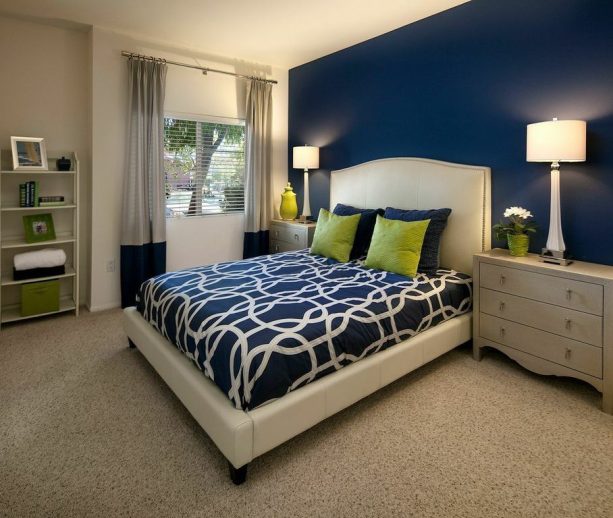 combination of navy and white color with a silver accent in a contemporary bedroom