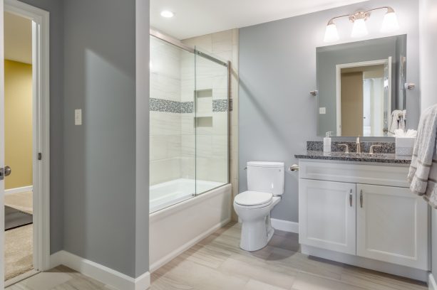 crisp and polished man cave bathroom with porcelain tile