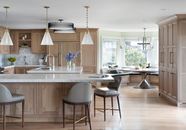 french white oak cabinets with coastal style quartz countertops