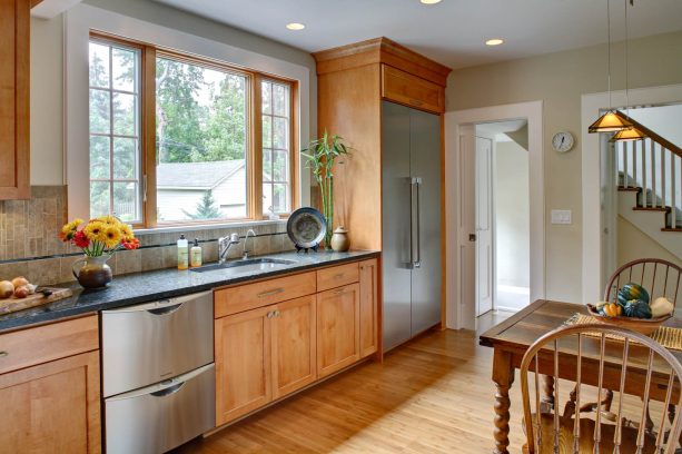 honey oak trim with benjamin moore cream fleece in a traditional kitchen