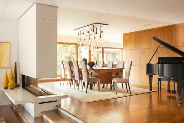 ivory wall paint color with honey oak trim in a mid-century dining room