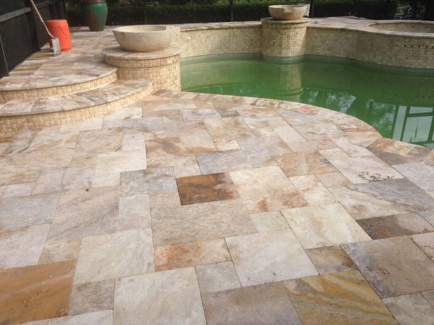 light colors stamped concrete combination in a mediterranean patio