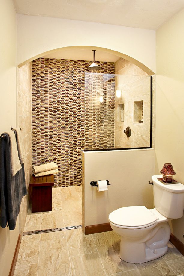 mid-sized man cave bathroom with beige tile floor