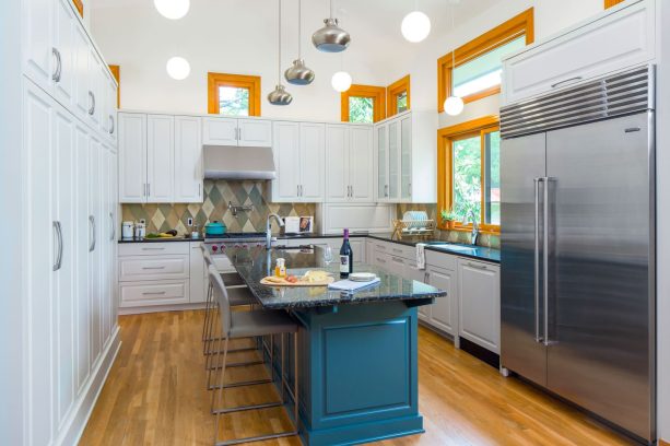 polished white wall paint color paired with honey oak trim for a transitional look