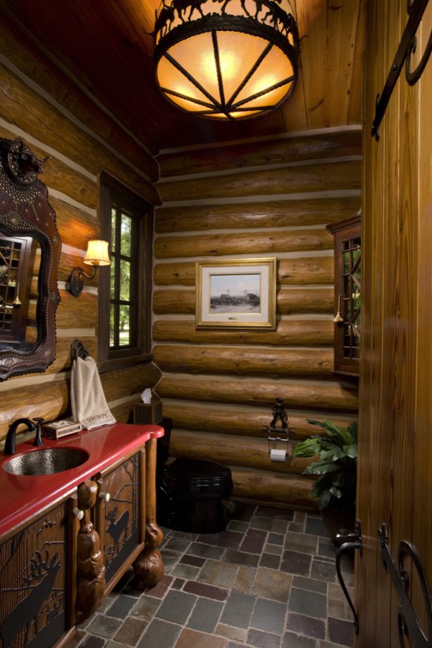 the idea of using wood wall and slate floor in a man cave bathroom