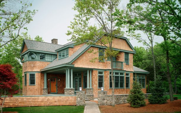 brown front door paired with green trim