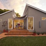 combination of gray wall and white trim as an exterior color for a ranch house