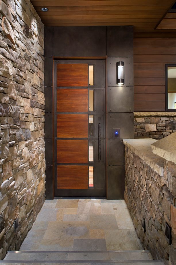 combination of the dark and medium tones of wood to create a brown front door