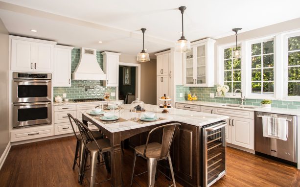 crown molding as a trim to conceal the wall slope in the kitchen