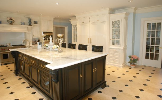 custom crown and bottom molding as a traditional kitchen cabinet trim