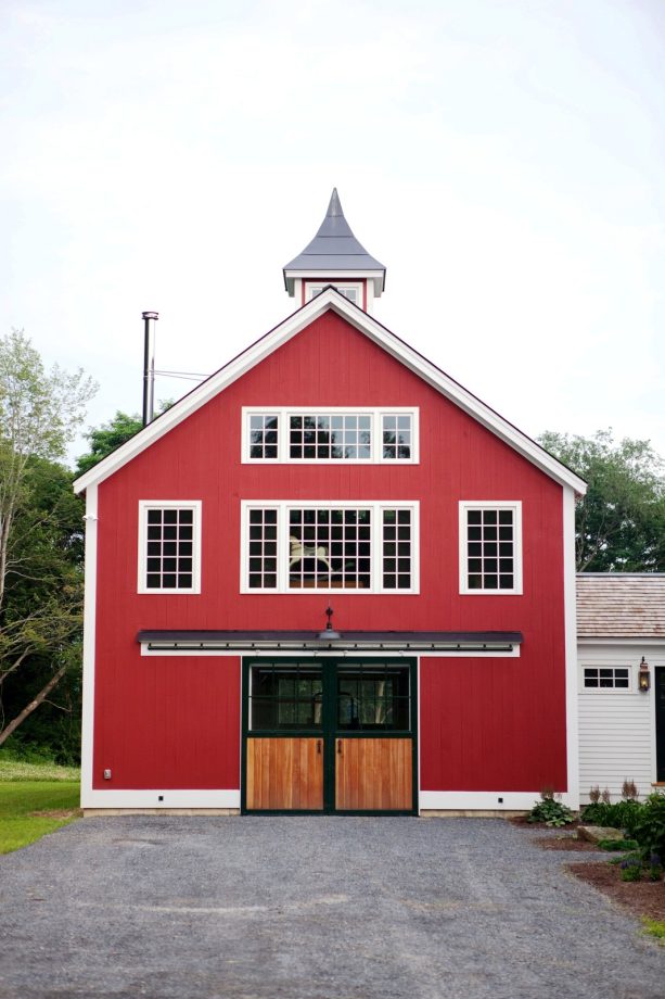 dark barn doors with wood panels and windows