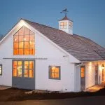 half x-brace barn doors with window panels at the top