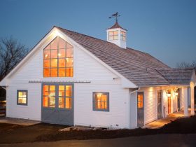 half x-brace barn doors with window panels at the top