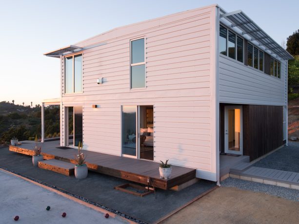 horizontal and vertical slide windows in a white metal building