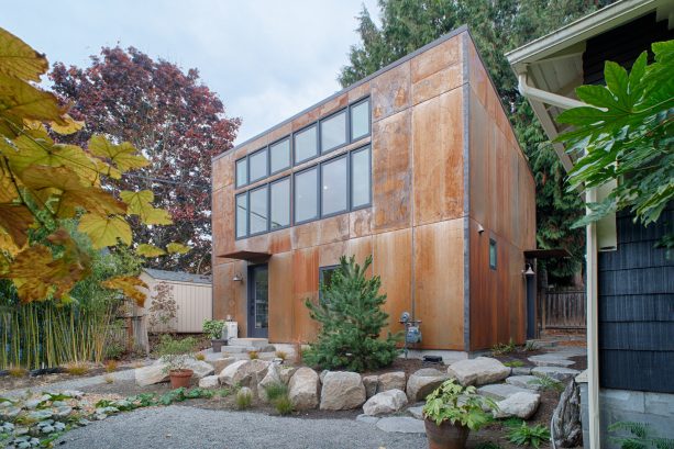metal building with weathering steel siding and sized panels for windows