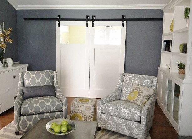 modern barn doors with a single piece of glass as a window