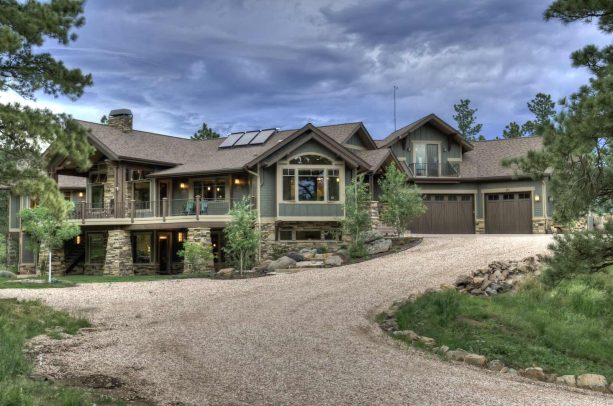 teal wall and gray-green trim in a ranch house with craftsman exterior